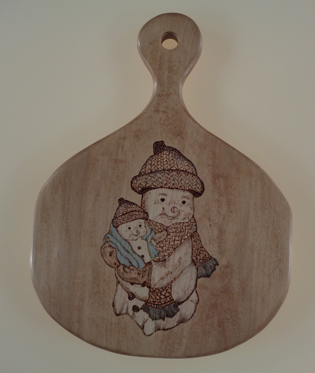 Snowman holding baby