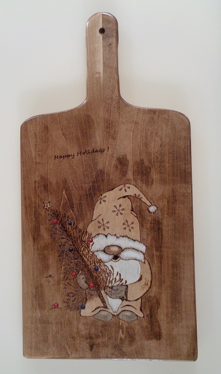 Gnome woodburned into a maple charcuterie board