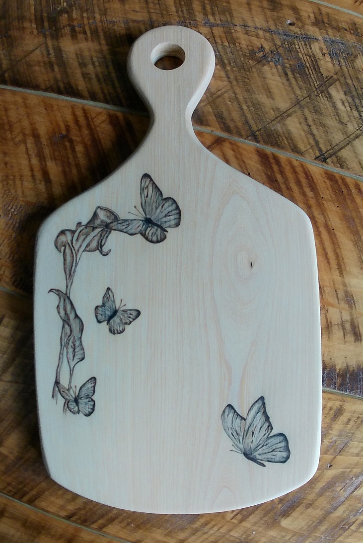 pyrography with calla lilies and butterflies on maple board
