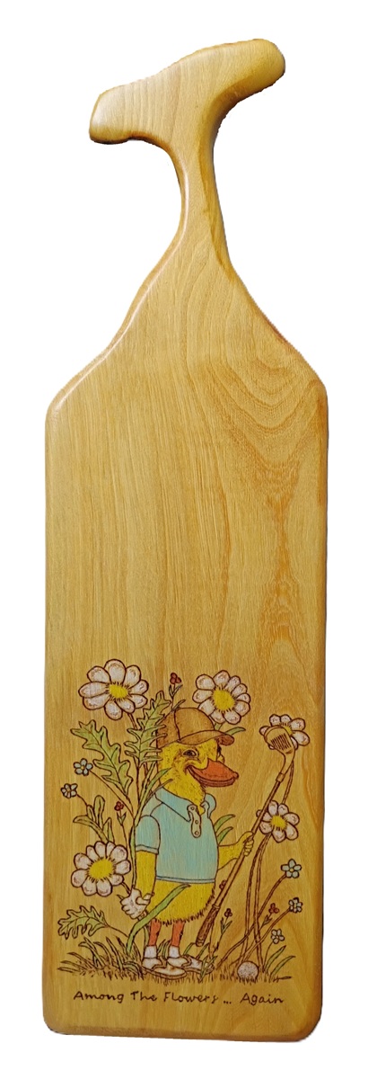 A comial duck with a golf clubn wood burned on goiabao wood